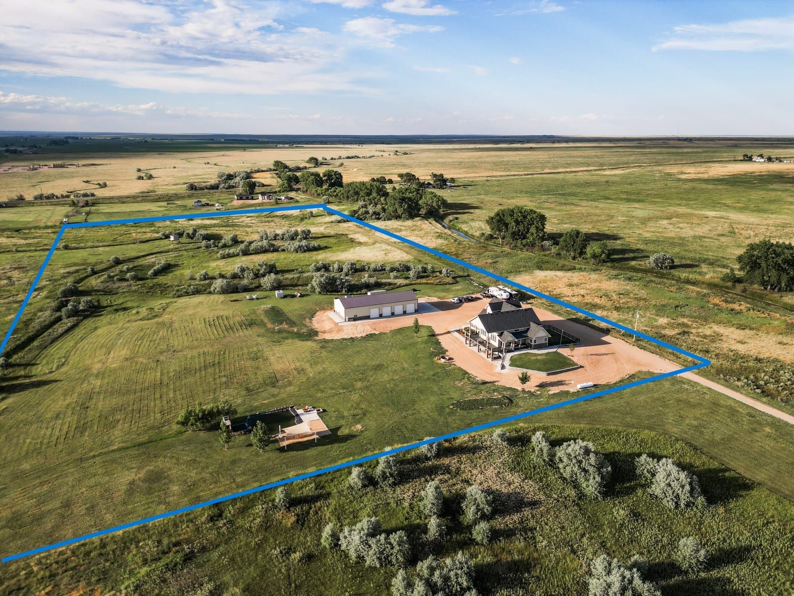 Aerial view of a 20 acre Weld County estate listed by Suzy